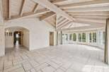 This stunning property boasts a spacious interior with a unique architectural design.