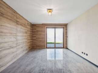 This stunning property boasts a modern interior with sleek design elements.
