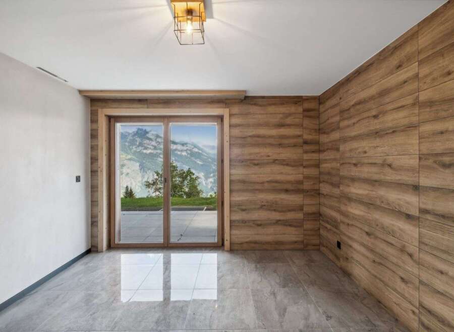 Experience the epitome of modern elegance in this stunning property, featuring a seamless blend of natural elements and contemporary design.