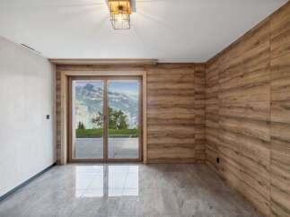 Experience the epitome of modern elegance in this stunning property, featuring a seamless blend of natural elements and contemporary design.