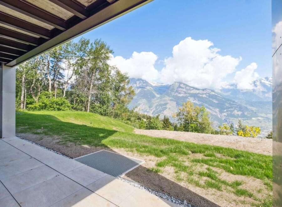 Experience breathtaking mountain views from this stunning property.
