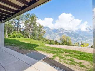 Experience breathtaking mountain views from this stunning property.