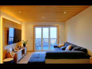 Experience luxury living in this stunning property! Featuring a modern interior with a cozy living room, perfect for relaxation.
