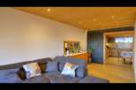 Discover the charm of this beautifully designed living space, featuring a cozy sectional sofa perfect for relaxation.