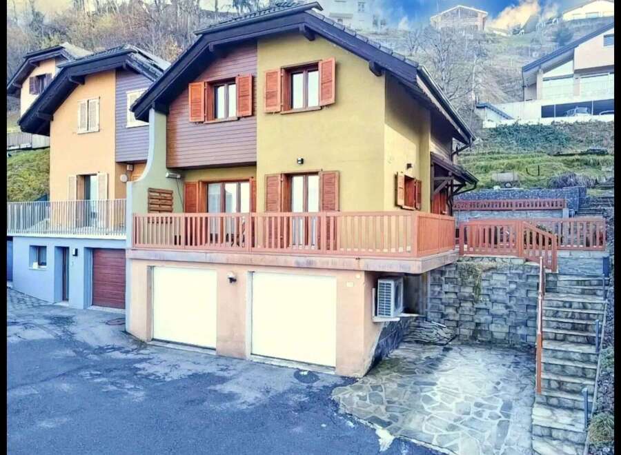 Discover this charming property featuring a unique design and inviting facade.
