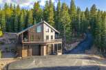 Nestled amidst a lush forest, this stunning property offers a serene retreat.