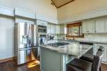 This stunning kitchen boasts modern appliances and elegant design.