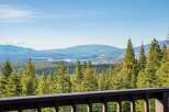 Enjoy breathtaking views from this stunning property! This home offers panoramic vistas of lush forests, serene lakes, and majestic mountains.