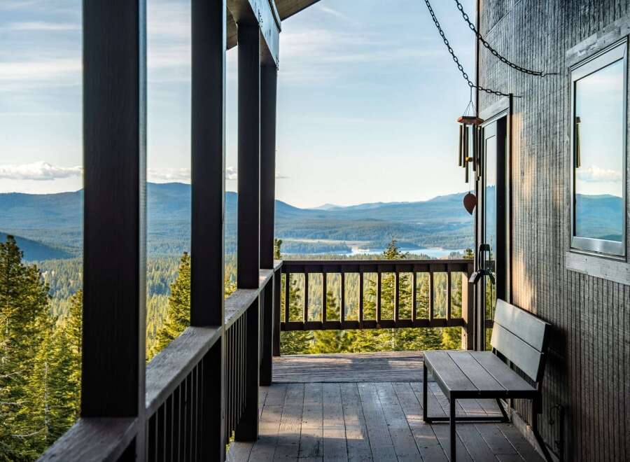 Enjoy breathtaking views from this stunning property! This home features a spacious deck, perfect for relaxing and taking in the surrounding natural beauty.