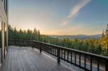 Enjoy breathtaking views from this stunning property! This home features a spacious deck, perfect for relaxing and taking in the natural beauty.