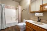 Step into this inviting bathroom featuring a classic design and functional layout.