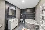 Step into modern luxury with this stunning bathroom.