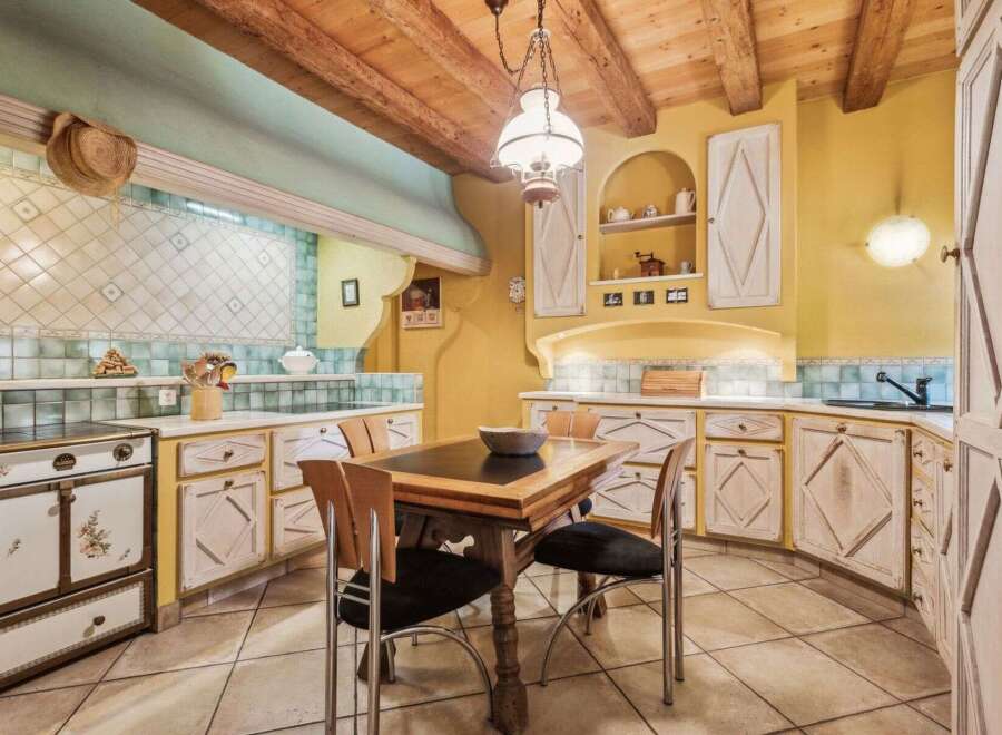 Step into this charming kitchen, a perfect blend of rustic elegance and modern convenience.