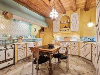 Step into this charming kitchen, a perfect blend of rustic elegance and modern convenience.