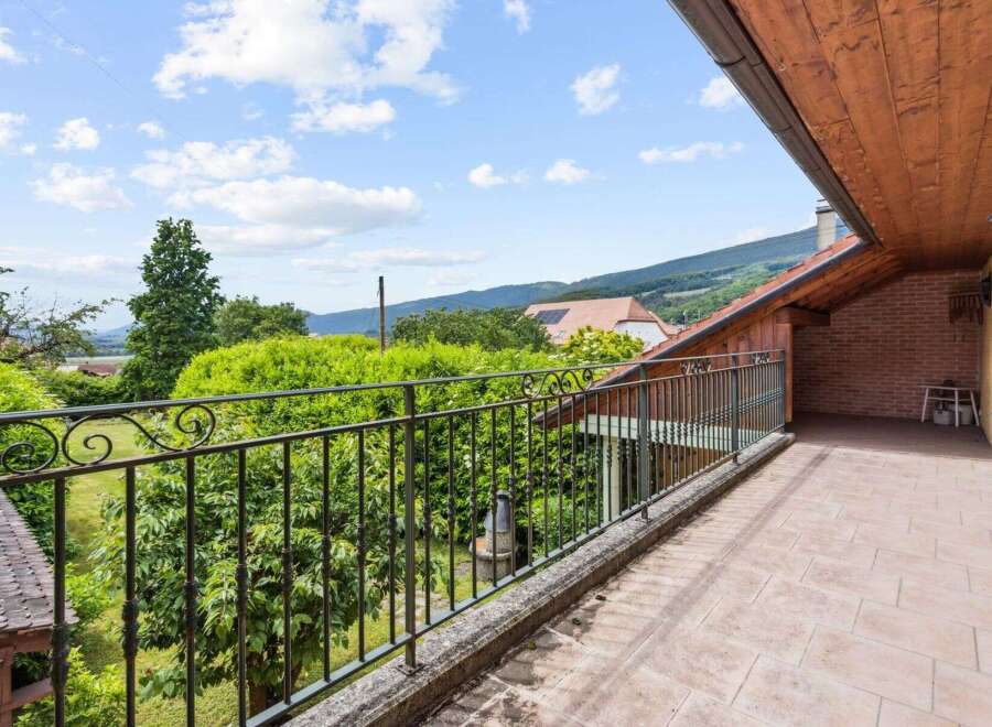 Enjoy breathtaking views from this charming balcony.