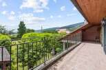 Enjoy breathtaking views from this charming balcony.