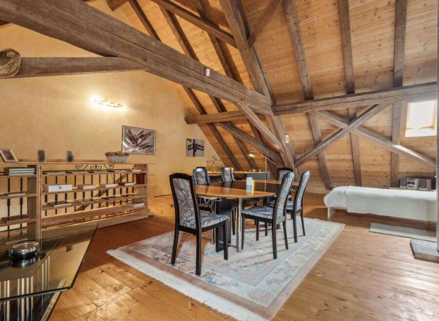 Discover the charm of this unique property featuring a stunning wooden beamed ceiling and a spacious open-plan living area.
