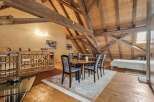 Discover the charm of this unique property featuring a stunning wooden beamed ceiling and a spacious open-plan living area.