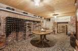 Step into a wine lover's paradise with this stunning wine cellar.