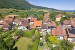 Discover a charming village nestled in a picturesque landscape, perfect for those seeking tranquility and natural beauty.