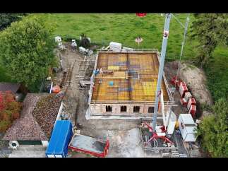 Construction is underway on this property, showcasing a modern design with a focus on quality craftsmanship.