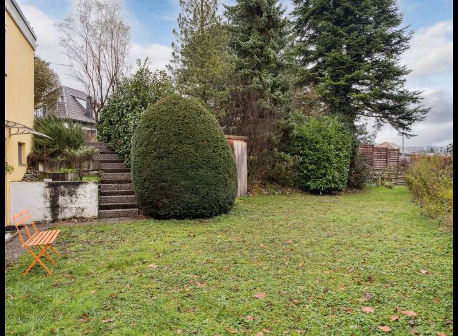 Discover the charm of this property, featuring a beautifully landscaped backyard.