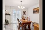 Step into this inviting dining room, perfect for family gatherings and entertaining guests.