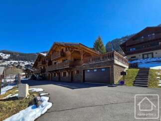 Discover a stunning chalet nestled in the heart of the mountains, offering breathtaking views and a serene atmosphere.