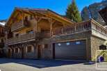 Discover the charm of this stunning wooden chalet, perfectly nestled in a picturesque mountain setting.