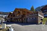 Discover the charm of this stunning wooden chalet, perfectly nestled in a picturesque mountain setting.