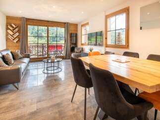Experience luxury living in this stunning property, featuring a spacious living area with a modern design.