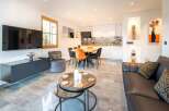 This stunning property boasts a modern living space, perfect for entertaining and relaxation.