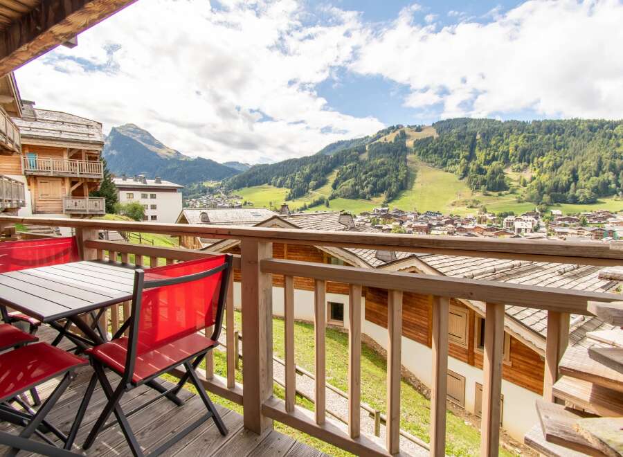 Enjoy breathtaking mountain views from this charming chalet.