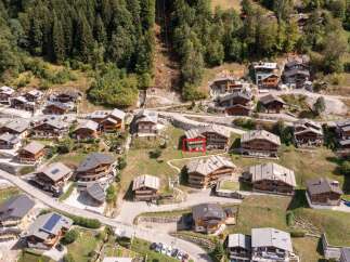 Nestled in a picturesque mountain village, this stunning property offers breathtaking views and a tranquil escape.
