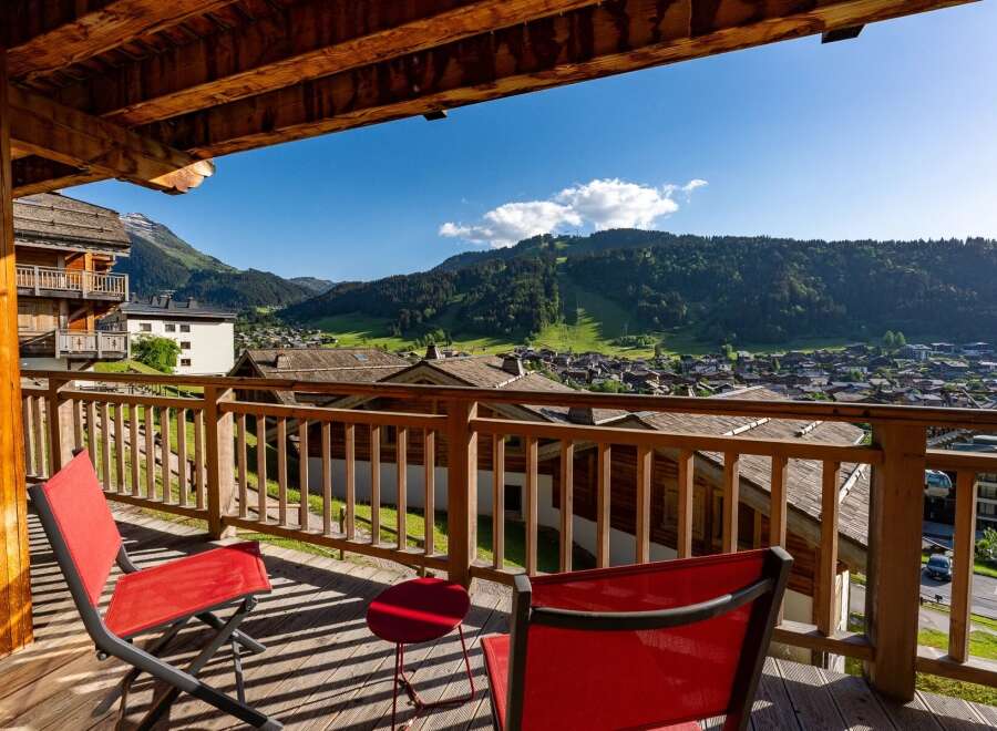 Enjoy breathtaking mountain views from this charming balcony, perfect for morning coffee or evening relaxation.