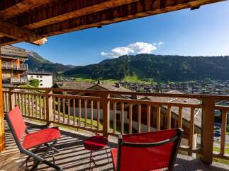 Enjoy breathtaking mountain views from this charming balcony, perfect for morning coffee or evening relaxation.