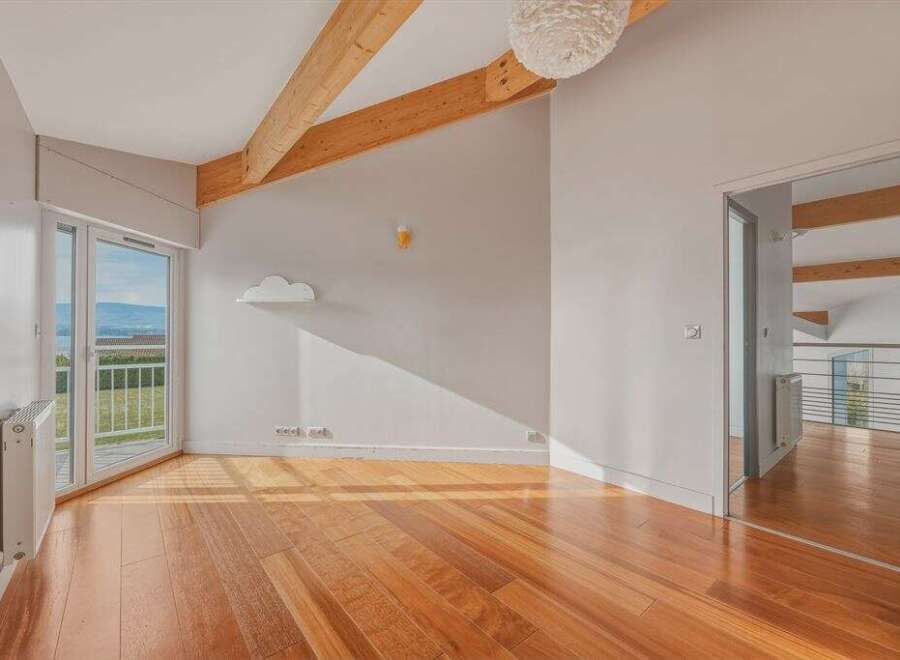 Discover the charm of this stunning property, featuring a bright and airy interior with beautiful wooden floors.