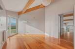 Discover the charm of this stunning property, featuring a bright and airy interior with beautiful wooden floors.