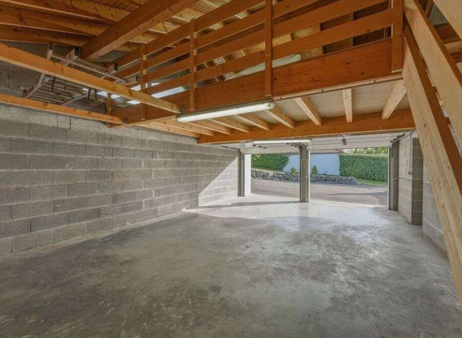 Discover the potential of this spacious garage, perfect for storage or a workshop.