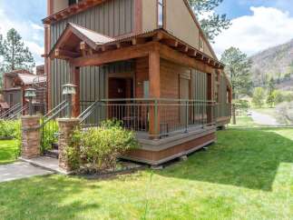 Discover the charm of this stunning property, featuring a beautifully designed exterior with a welcoming porch.