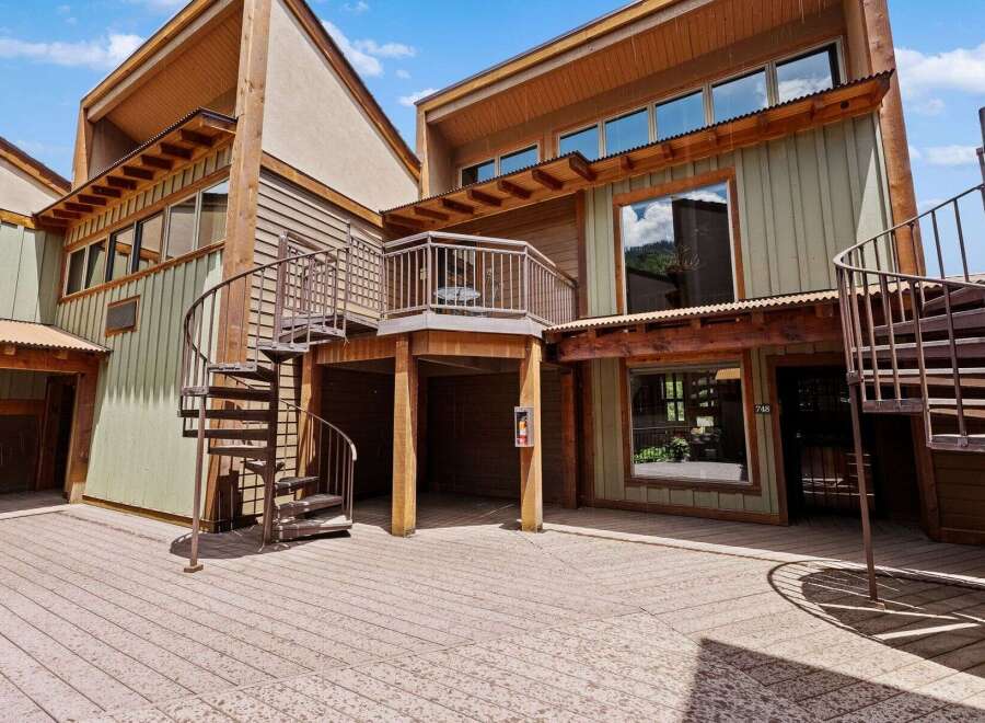 Discover this stunning property featuring a unique architectural design with multiple levels and spiral staircases.