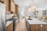 This stunning kitchen boasts modern design and high-end finishes.