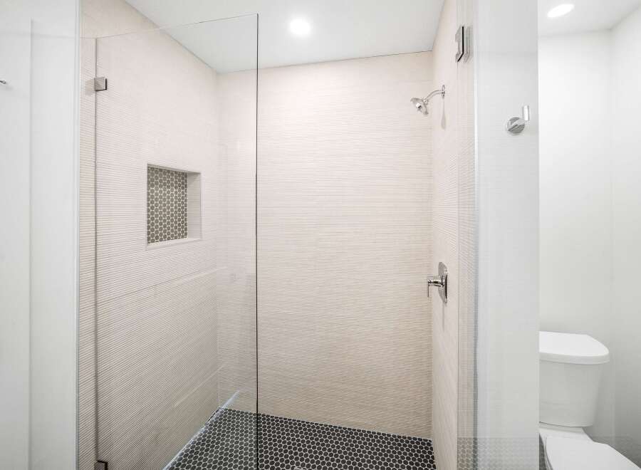 Step into a modern oasis with this stunning shower.