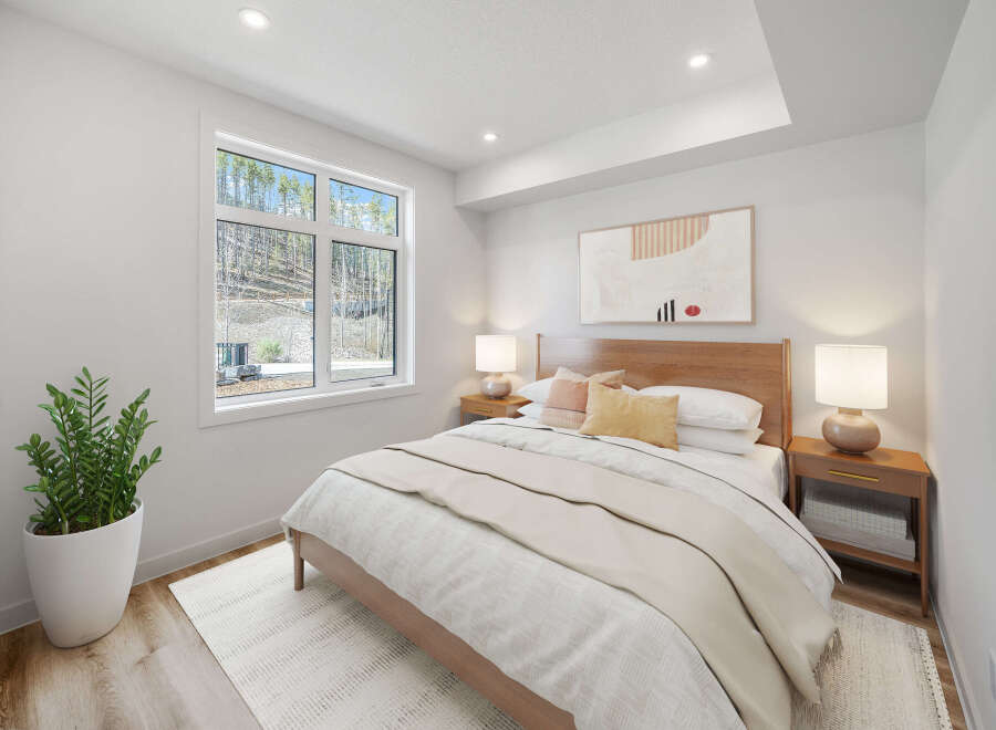 Step into this inviting bedroom, featuring a serene ambiance and modern design.