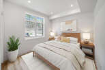 Step into this inviting bedroom, featuring a serene ambiance and modern design.
