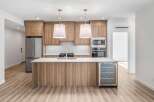 This stunning kitchen boasts modern design and high-end finishes.