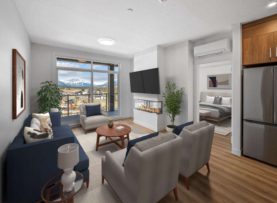 Experience luxury living in this stunning property! This modern space features a cozy fireplace, perfect for relaxing evenings.