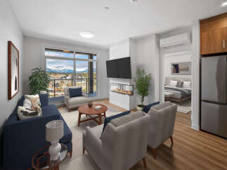 Experience luxury living in this stunning property! This modern space features a cozy fireplace, perfect for relaxing evenings.