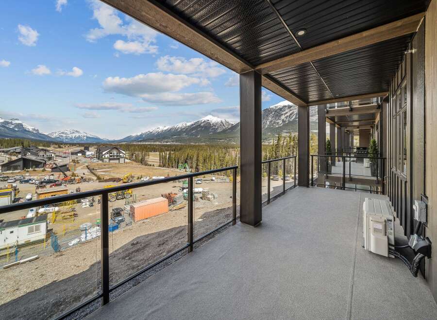 Enjoy breathtaking mountain views from this stunning balcony.