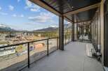 Enjoy breathtaking mountain views from this stunning balcony.
